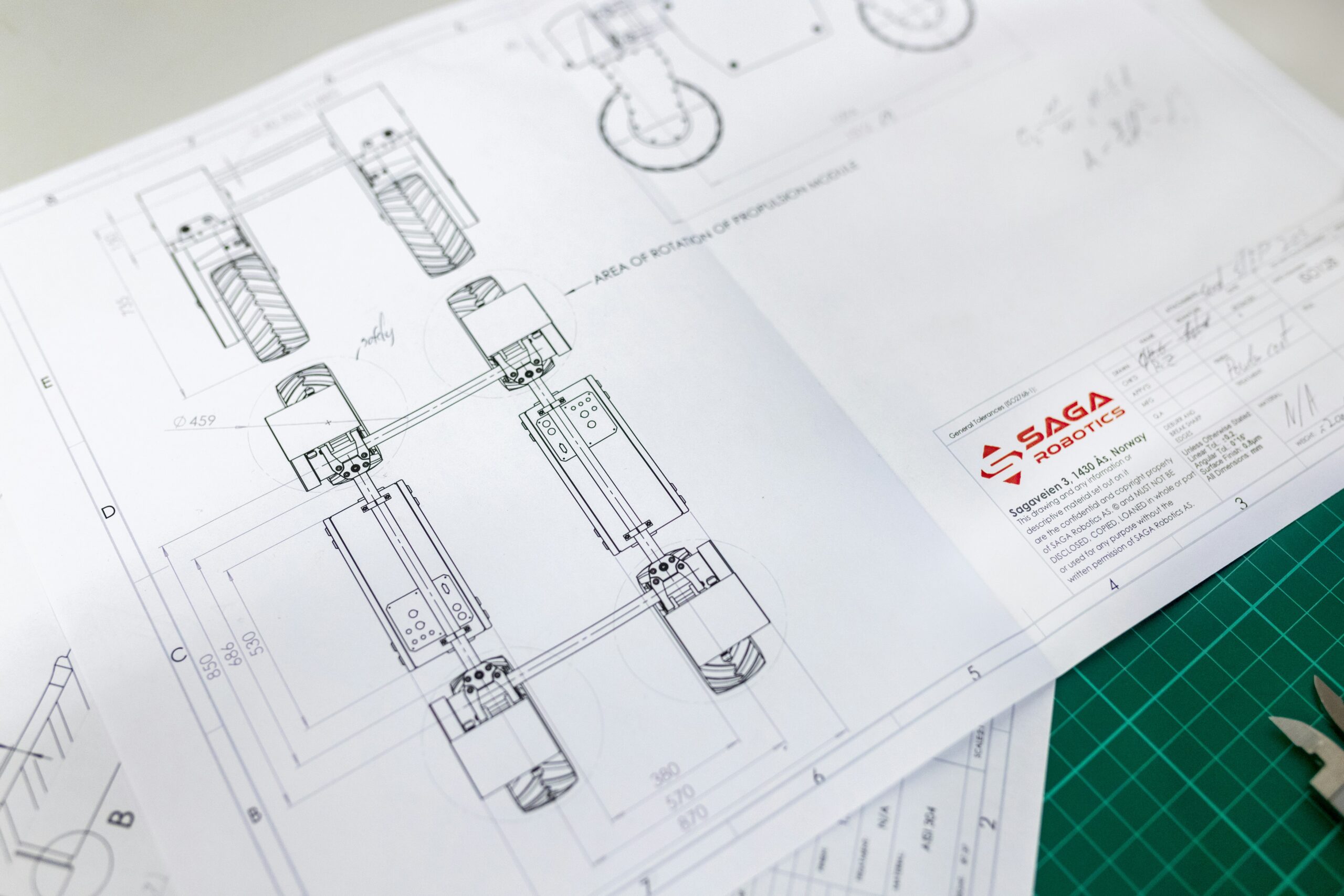 Code overlay on engineering blueprint - Agricultural robot designs